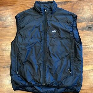 Patagonia insulated black nylon vest. Men’s XL. Great condition, quilted inside.